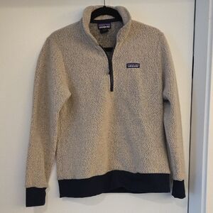 Patagonia's Beige and Black Zip-Up Sweater